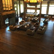 Sunriver Resort commons with hardwood flooring and stone fireplace